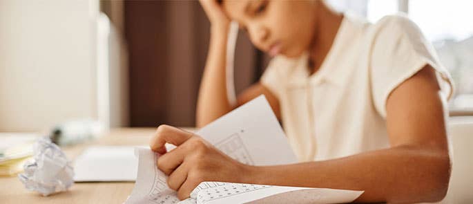 A student experiencing stress over a mock exam 